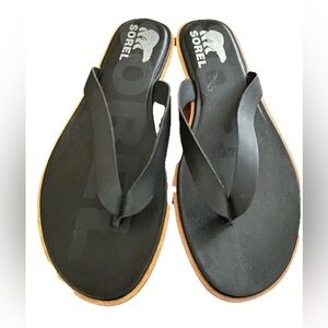women’s black Sorel ella flip flops size 7